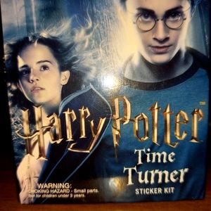 Harry Potter time turner! Comes with the time turner, and a sticker book!